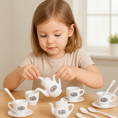 Close-up of a miniature plastic coffee cup & saucer for pretend play