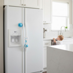 Child safety lock installed on cabinet