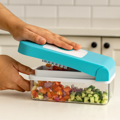 Blue Ganesh vegetable dicer components laid out.