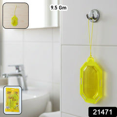 Citrus gel air freshener hanging in a modern bathroom