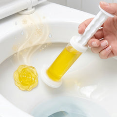 Flower toilet gel stamp applied inside toilet bowl