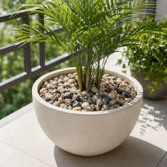 Decorative pebbles used as a base in an aquarium and as filler in a clear glass vase.