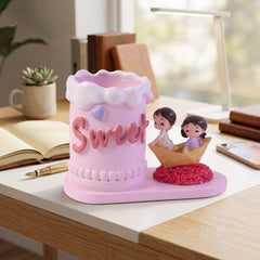 Love couple pen holder on white background