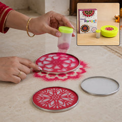 A person sprinkles pink rangoli powder through a floral stencil onto a light-colored floor, creating a design.