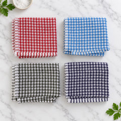 Four folded checked kitchen towels