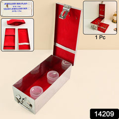 Open view of steel velvet jewellery box with lock and red interior India