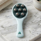 Ergonomic handheld body massager with 7 stainless steel balls.