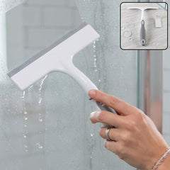 Plastic multifunctional glass wiper in use