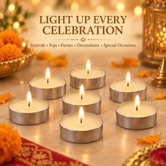 Seven lit tea light candles arranged on a table with decorative flowers and a lantern.