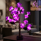Artificial flower LED decorative lamp glowing on a table