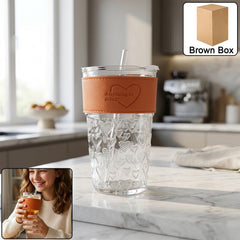 Clear glass drinking tumbler with lid