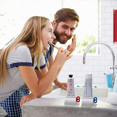Toothpaste squeezer with stand holder on bathroom counter