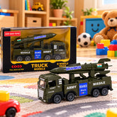 A green toy army truck with a missile launcher on its back sits on a colorful rug next to its packaging.