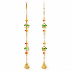 Two identical door hangings with white pearls, green parrots, orange pom-poms, and golden bells on a white background.