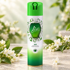 Green and white Lia Jas room freshener aerosol can with jasmine flowers on a marble surface.