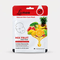 A white and red facial sheet mask package with fruit designs, including pineapple, mango, and watermelon, is centered on a