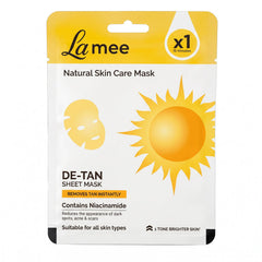 Front view of a white and yellow de-tan sheet mask package with sun and face graphics.