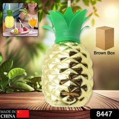 Side view of pineapple cup with straw
