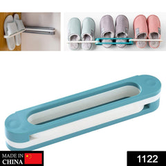 Close-up of folding shoe rack holding slippers