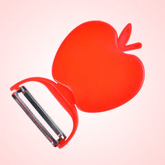 Side angle of apple shaped peeler showing handle