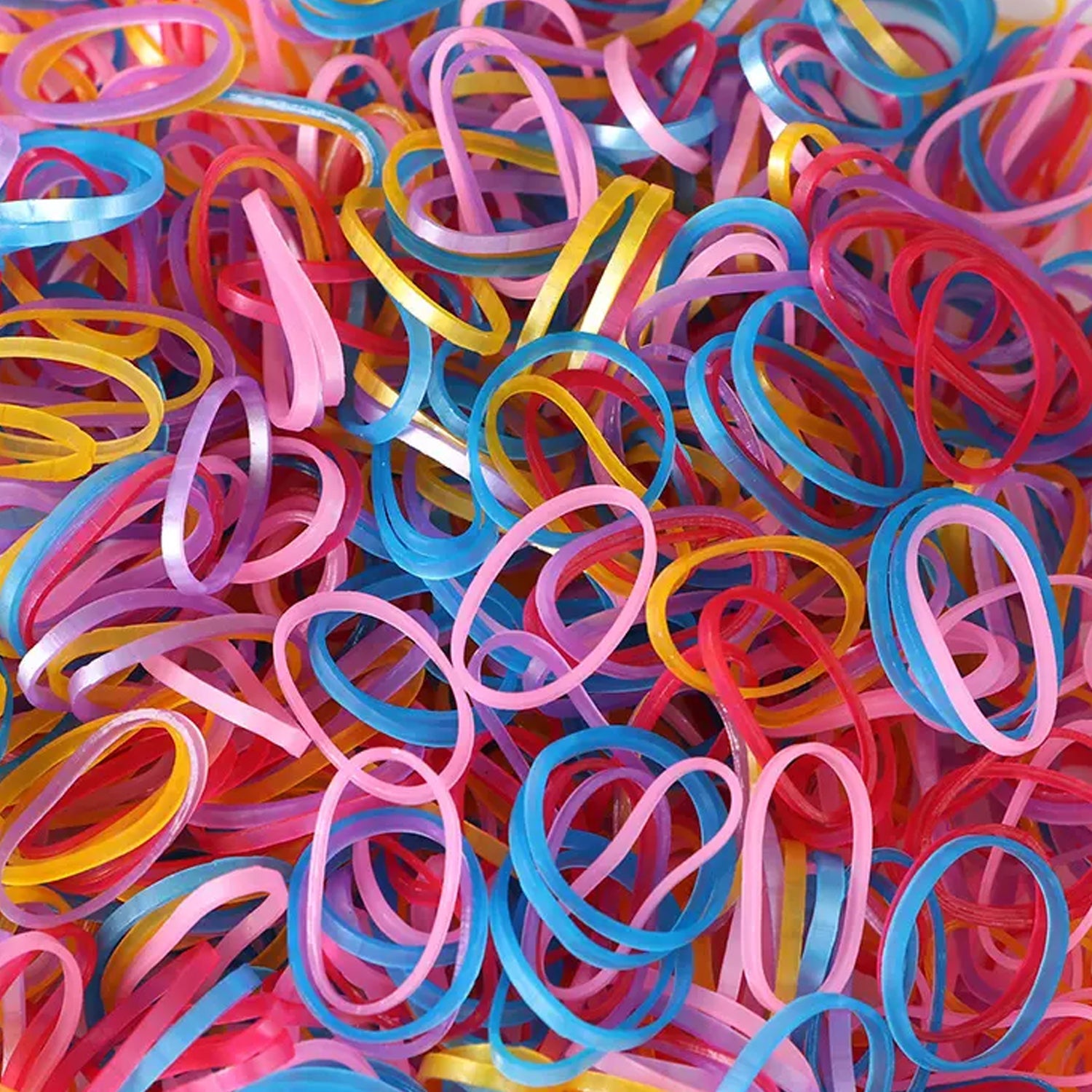 Multicolor elastic rubber bands bundle on white background