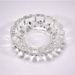 Elegant clear glass ashtray with smooth finish.