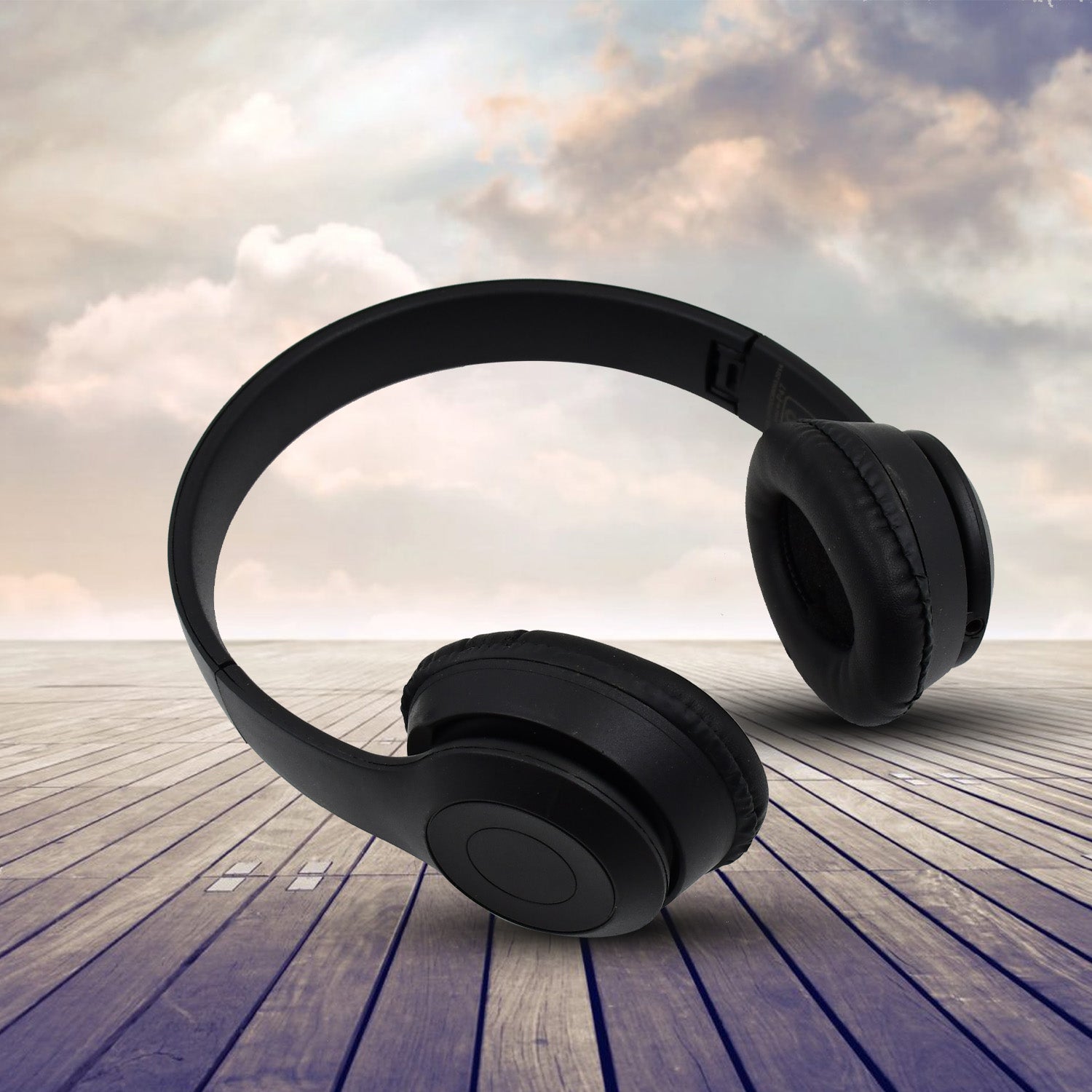 Stylish black foldable wireless headphones with cushioned earcups.