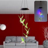 Solar hummingbird wind chime with colorful glowing LED lights