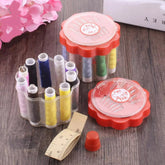 Portable sewing box with compartments organizing threads and sewing tools