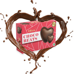Pink box of heart-shaped chocolates surrounded by a splash of liquid chocolate forming a heart shape.