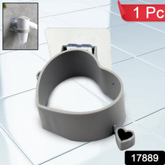 Hair dryer holder attached to tile wall