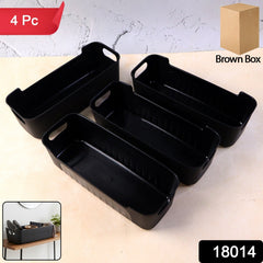 Close-up of black plastic storage trays with handles