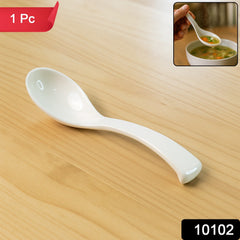 White deep bowl plastic soup spoon