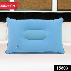 Compact inflatable travel pillow in use