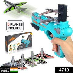 Kids playing outdoors with airplane launcher