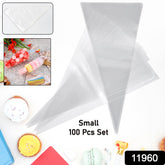 Close-up of disposable piping bag with icing and nozzle