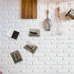 Stainless steel wall hooks holding towels and robes