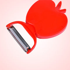 Peeler being used to peel potato skin