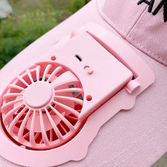 Close up of mini fan on hat brim