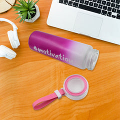Close-up of colorful glass water bottle design