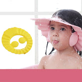 Soft adjustable baby shower cap protecting eyes and ears