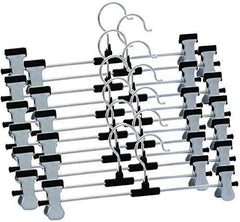 Close-up of hanger clips adjusted for pants