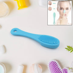 Silicone Finger Brush Facial Cleansing Scrubber in hand