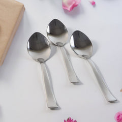 Close-up of dining spoons with contoured handles