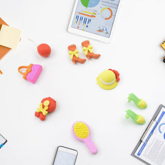Colorful mini erasers displayed together, featuring playful designs