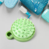 Portable scalp massage comb on white background