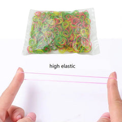 Multicolor elastic rubber bands holding stationery