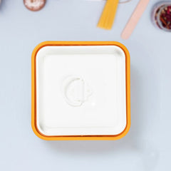 Using Paneer Maker to press and drain water