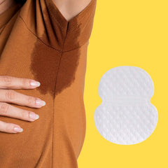 Underarm sweat pads laid out on surface