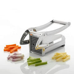 Close-up of blade slicing potatoes into fries